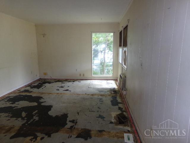 2528 Mariposa Dr, Colerain Twp, OH 45231 - empty room with radiator heating unit and baseboards