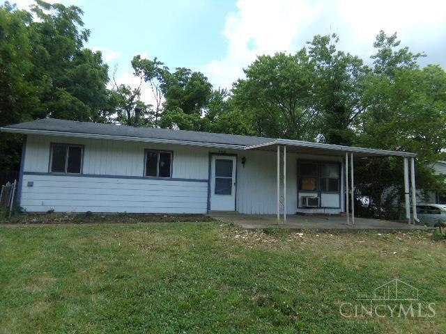 2528 Mariposa Dr, Colerain Twp, OH 45231 - view of front of property featuring a front yard, cooling unit, and a porch