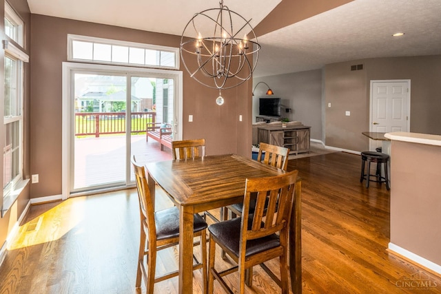 3773 Top Flite Ln, Mason, OH 45040 - dining room with wood finished floors and a chandelier