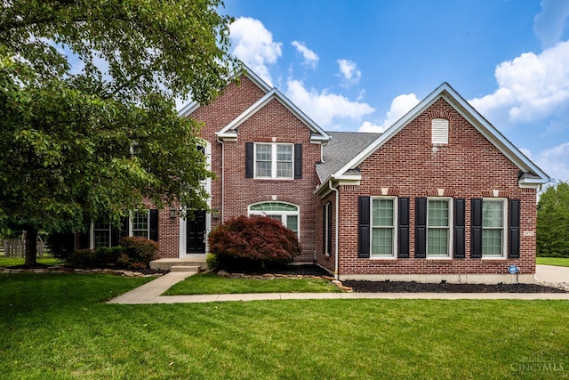 3773 Top Flite Ln, Mason, OH 45040 - traditional-style house with a front yard and brick siding