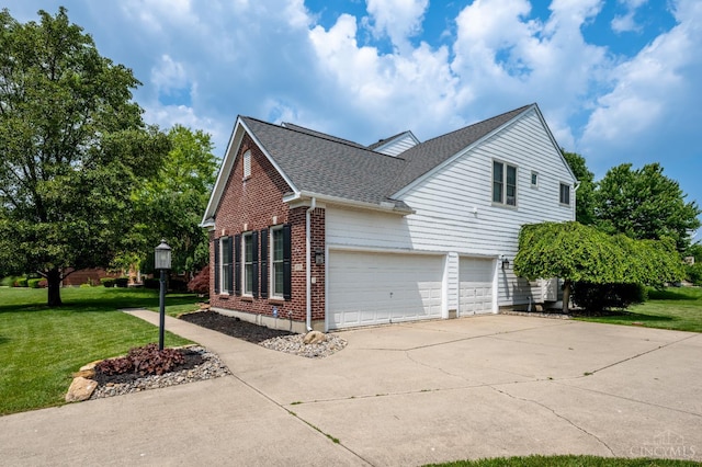 3773 Top Flite Ln, Mason, OH 45040 - view of property exterior with roof with shingles, concrete driveway, brick siding, a lawn, and a garage
