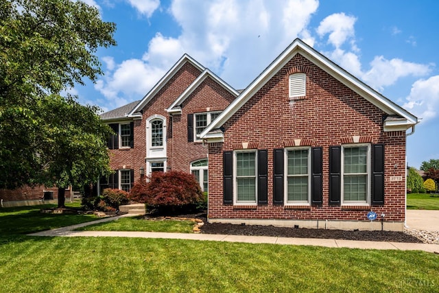 3773 Top Flite Ln, Mason, OH 45040 - view of front of house with brick siding and a front lawn