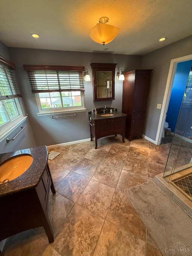3773 Top Flite Ln, Mason, OH 45040 - full bath featuring two vanities and a textured ceiling