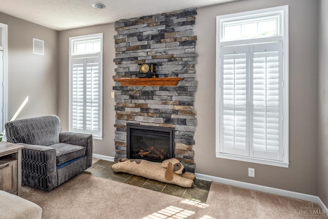 3773 Top Flite Ln, Mason, OH 45040 - living area with a stone fireplace and carpet