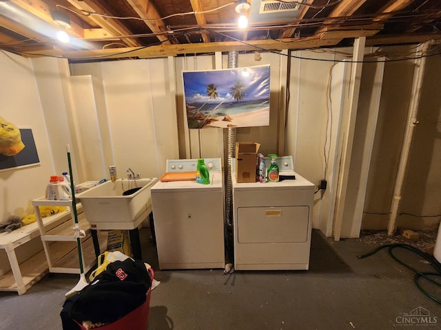 2920 Spruceway Dr, Colerain Twp, OH 45251 - unfinished basement with washing machine and clothes dryer and a sink