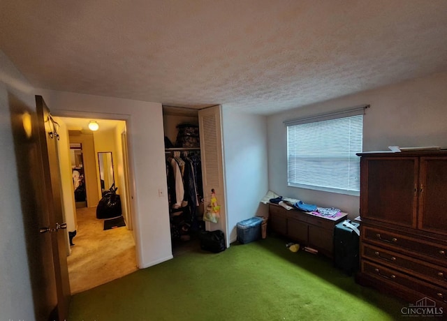 2920 Spruceway Dr, Colerain Twp, OH 45251 - carpeted bedroom featuring a closet and a textured ceiling