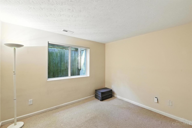 1123 Elk Run, Hamilton Twp, OH 45039 - empty room with a textured ceiling and carpet