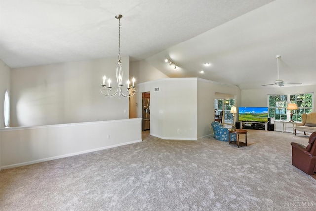 1123 Elk Run, Hamilton Twp, OH 45039 - carpeted living room with vaulted ceiling, a chandelier, plenty of natural light, and a ceiling fan