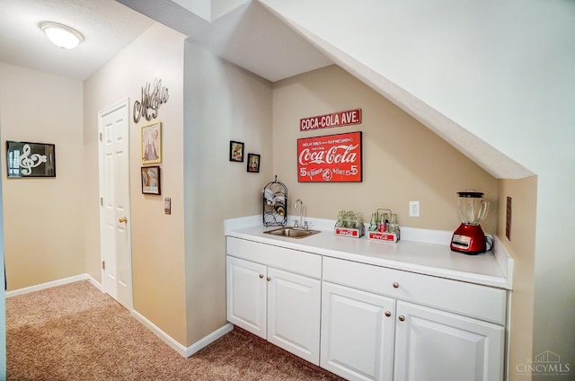 5788 Spire Ridge Ct Unit 13B, Green Twp, OH 45247 - indoor wet bar with carpet flooring and baseboards