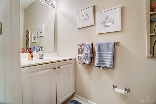 5788 Spire Ridge Ct Unit 13B, Green Twp, OH 45247 - bathroom with vanity and baseboards