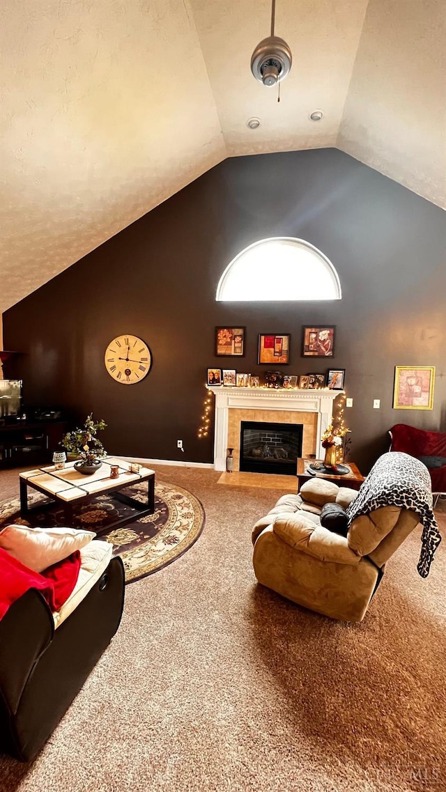 420 Lake Shore Dr, Lebanon, OH 45036 - living area featuring carpet floors, a tile fireplace, and vaulted ceiling