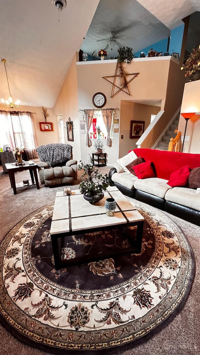 420 Lake Shore Dr, Lebanon, OH 45036 - carpeted living room with a ceiling fan, stairs, and a chandelier