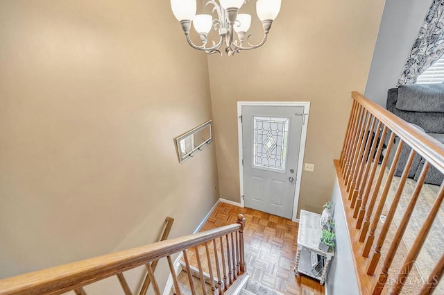 8798 Beckys Ridge Dr, Colerain Twp, OH 45251 - entrance foyer with a chandelier, healthy amount of natural light, and stairs