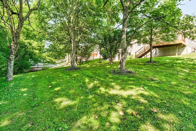 1583 Creekside Rd, Batavia Twp, OH 45102 - view of yard with stairway and a wooden deck