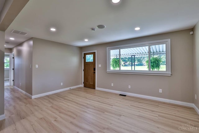 711 S Main St, Monroe, OH 45050 - foyer entrance with healthy amount of natural light, light wood-type flooring, and recessed lighting