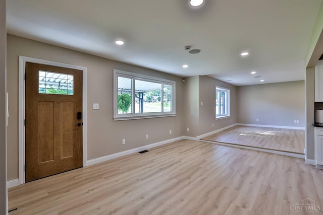 711 S Main St, Monroe, OH 45050 - foyer entrance featuring light wood-type flooring and recessed lighting