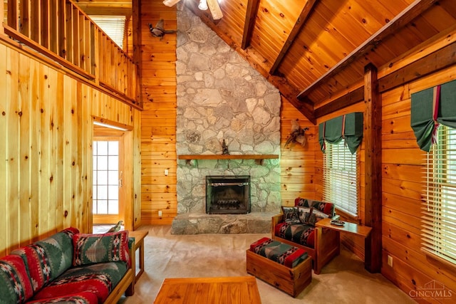 2914 Pond Run Ln, Pierce Twp, OH 45157 - living room with plenty of natural light, wooden ceiling, a stone fireplace, carpet, and wood walls
