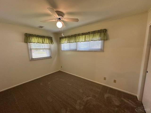 4068 Glenbar Ct, Sycamore Twp, OH 45236 - unfurnished room with dark carpet, ceiling fan, and crown molding