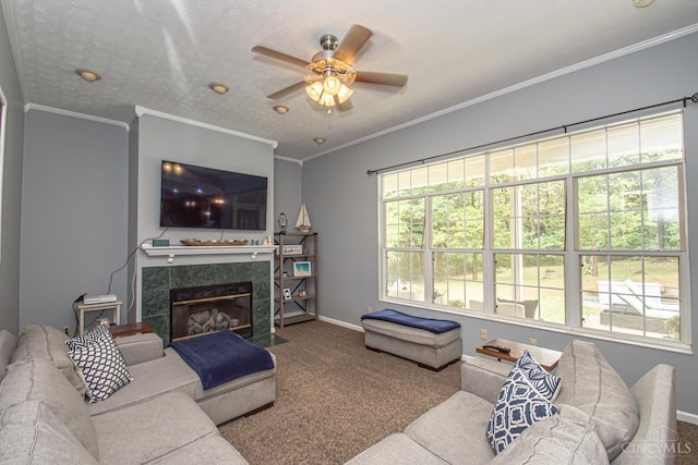 1887 Bantas Creek Rd, Washington Twp, OH 45320 - carpeted living room featuring a ceiling fan, a premium fireplace, and crown molding