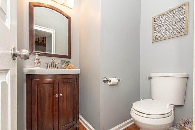 1887 Bantas Creek Rd, Washington Twp, OH 45320 - half bathroom featuring vanity and toilet