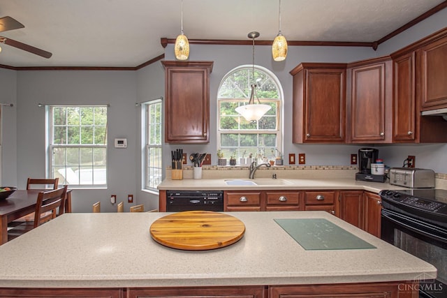 1887 Bantas Creek Rd, Washington Twp, OH 45320 - kitchen with black appliances, a ceiling fan, a kitchen island, pendant lighting, and crown molding