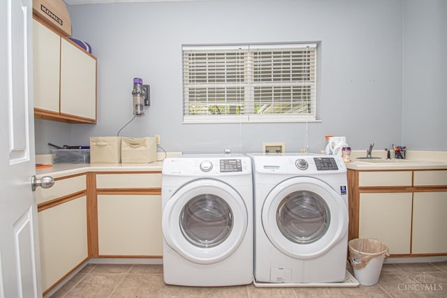 1887 Bantas Creek Rd, Washington Twp, OH 45320 - washroom with cabinet space, independent washer and dryer, and light tile patterned floors