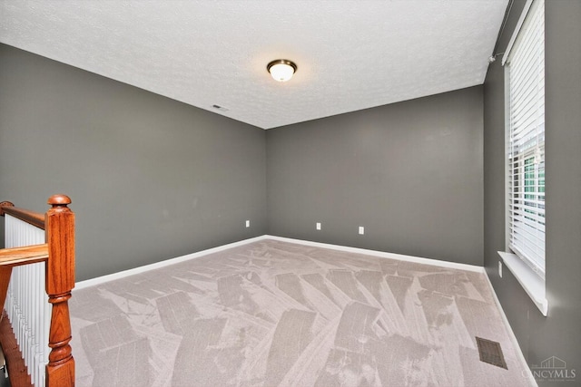 9985 Scotch Pine Dr, Clearcreek Twp, OH 45066 - unfurnished room featuring a textured ceiling and carpet floors