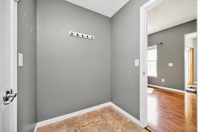 9985 Scotch Pine Dr, Clearcreek Twp, OH 45066 - interior space with baseboards and a textured ceiling