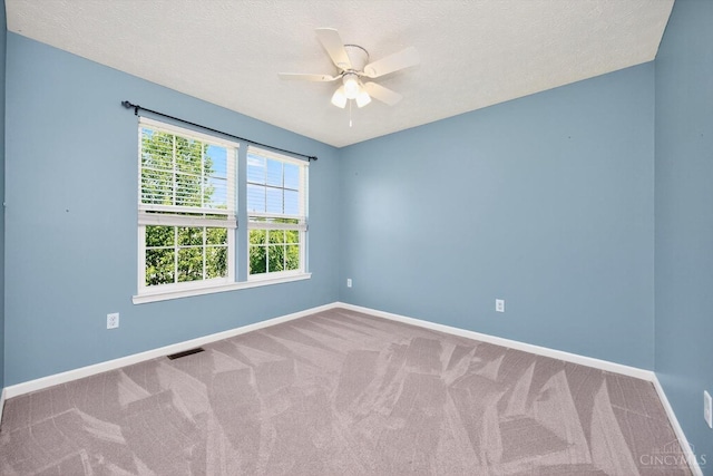9985 Scotch Pine Dr, Clearcreek Twp, OH 45066 - unfurnished room featuring carpet, ceiling fan, and a textured ceiling