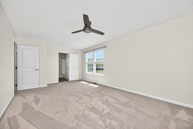 9985 Scotch Pine Dr, Clearcreek Twp, OH 45066 - unfurnished bedroom featuring carpet floors, a ceiling fan, and a textured ceiling
