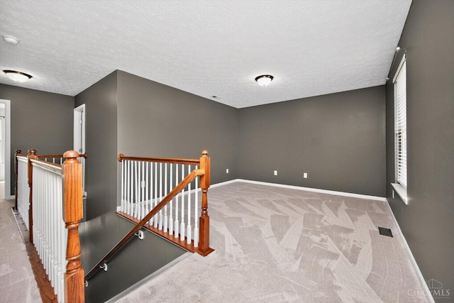 9985 Scotch Pine Dr, Clearcreek Twp, OH 45066 - carpeted spare room featuring baseboards and a textured ceiling