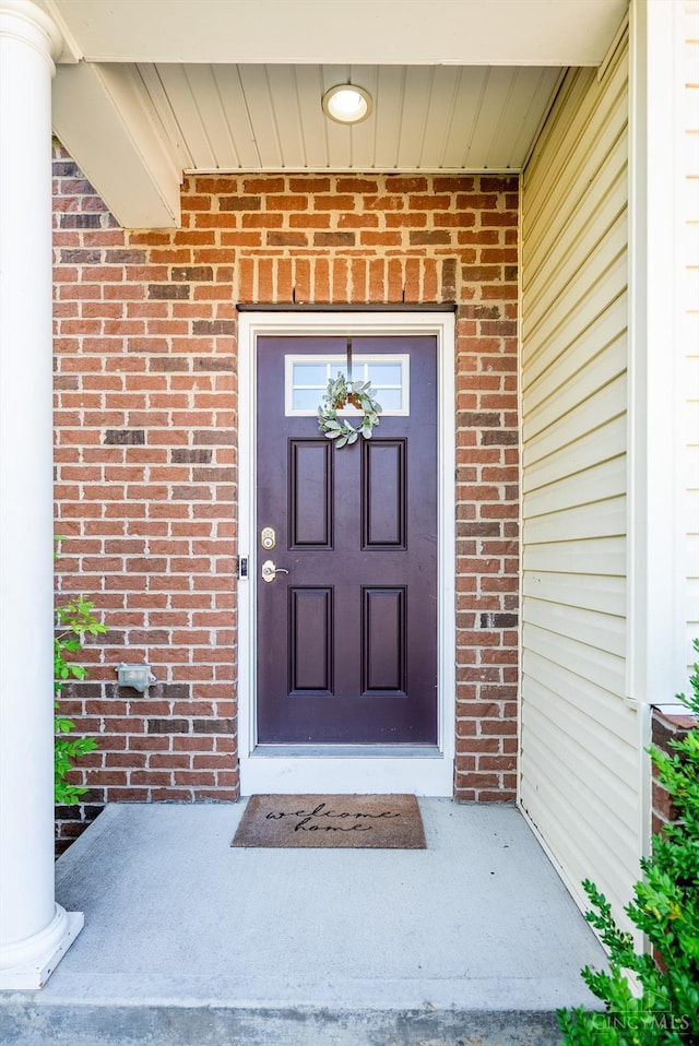 9985 Scotch Pine Dr, Clearcreek Twp, OH 45066 - doorway to property with brick siding