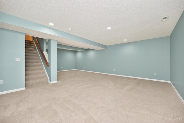 9985 Scotch Pine Dr, Clearcreek Twp, OH 45066 - finished basement featuring carpet, a textured ceiling, recessed lighting, and stairs