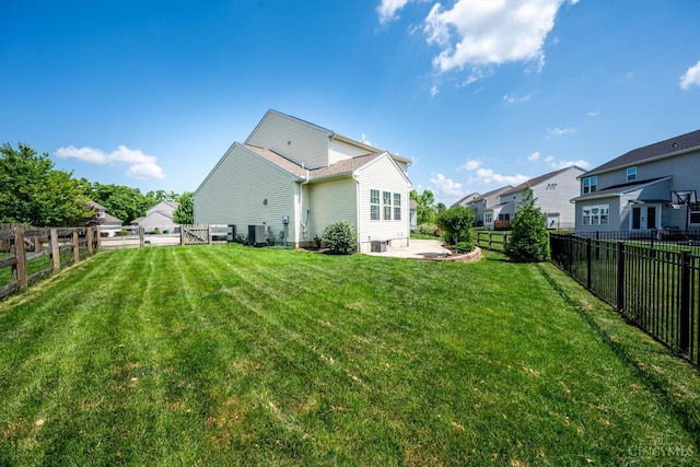 9985 Scotch Pine Dr, Clearcreek Twp, OH 45066 - back of house with a fenced backyard and a patio area