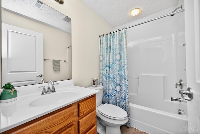 9985 Scotch Pine Dr, Clearcreek Twp, OH 45066 - bathroom with vanity, shower / bath combo, a textured ceiling, and tile patterned floors
