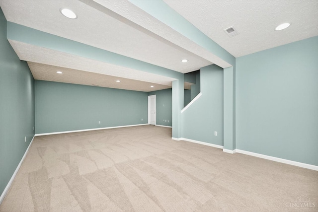 9985 Scotch Pine Dr, Clearcreek Twp, OH 45066 - finished below grade area featuring carpet flooring, recessed lighting, and a textured ceiling