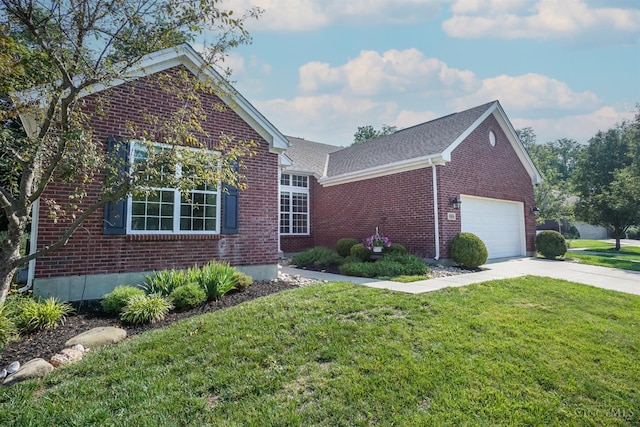 688 Humock Ct, Hamilton Twp, OH 45039 - ranch-style home with brick siding, a garage, a front lawn, driveway, and a shingled roof