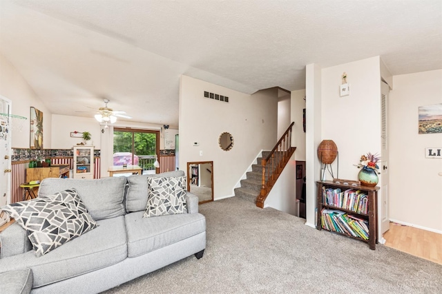 1167 Muirwood Ln, Union Twp, OH 45103 - living room featuring stairway, carpet, and ceiling fan