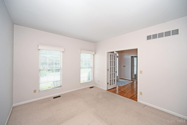 1001 Castlebay Dr, Pierce Twp, OH 45245 - carpeted spare room with baseboards and french doors