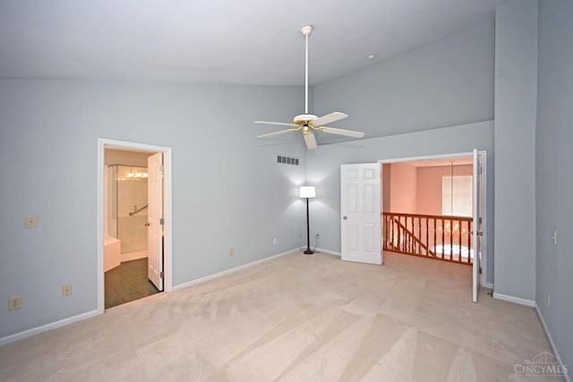 1001 Castlebay Dr, Pierce Twp, OH 45245 - empty room featuring vaulted ceiling, a ceiling fan, and light carpet