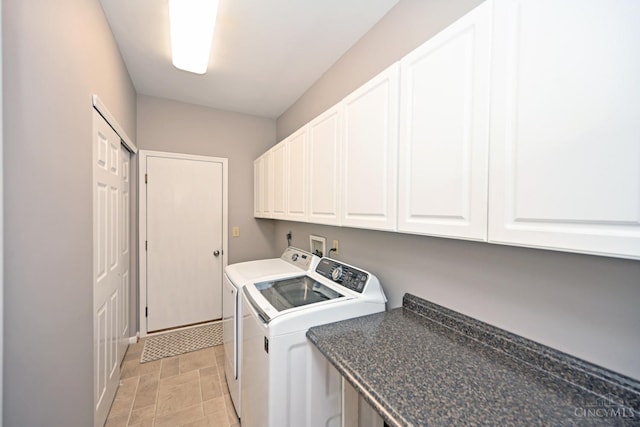 1001 Castlebay Dr, Pierce Twp, OH 45245 - laundry room with cabinet space and washer and clothes dryer