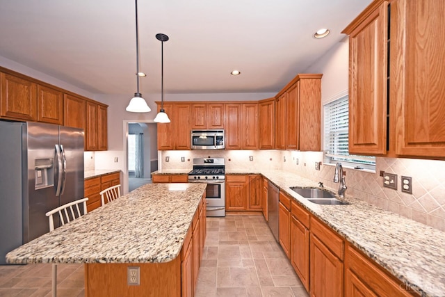 1001 Castlebay Dr, Pierce Twp, OH 45245 - kitchen featuring appliances with stainless steel finishes, plenty of natural light, light stone counters, decorative backsplash, and recessed lighting