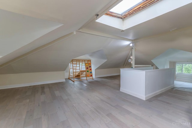 521 S Main St, Franklin, OH 45005 - additional living space featuring lofted ceiling, a skylight, and wood finished floors