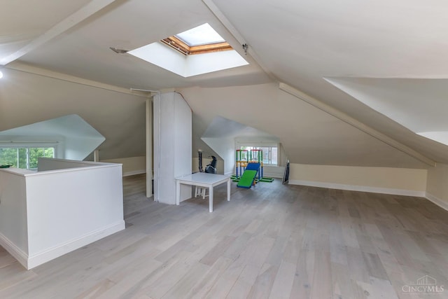 521 S Main St, Franklin, OH 45005 - bonus room featuring a skylight, light wood-style floors, lofted ceiling, and plenty of natural light