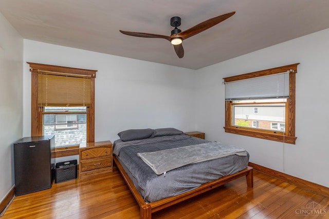 521 S Main St, Franklin, OH 45005 - bedroom with light wood-type flooring and ceiling fan