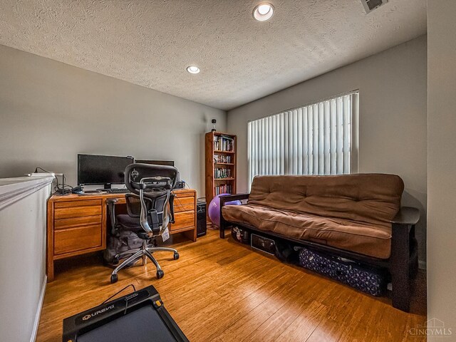 3649 Pebble Creek Ct, Mason, OH 45040 - office with wood finished floors, a textured ceiling, and recessed lighting