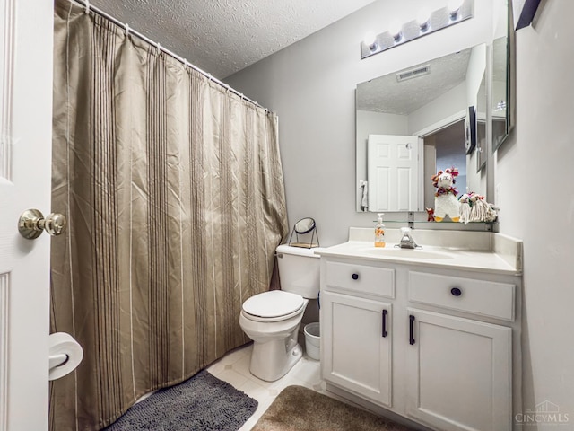 3649 Pebble Creek Ct, Mason, OH 45040 - full bath with a textured ceiling, vanity, tile patterned floors, and curtained shower