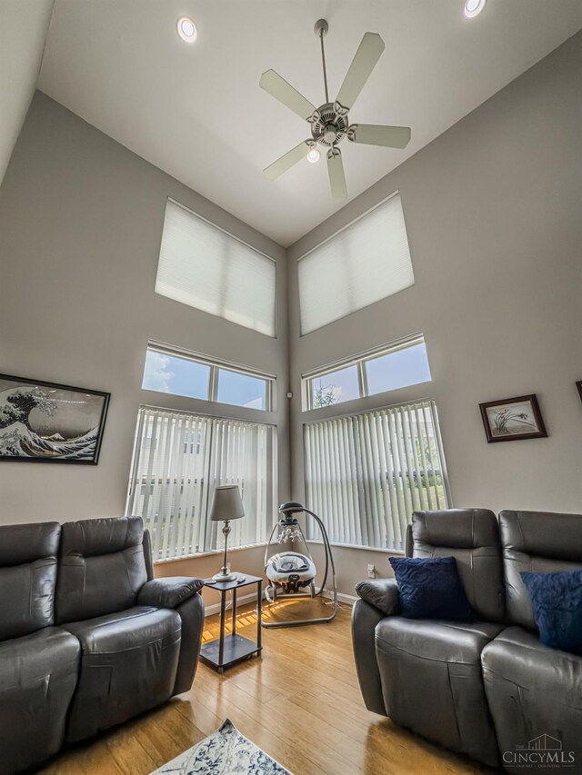 3649 Pebble Creek Ct, Mason, OH 45040 - living room with high vaulted ceiling, a ceiling fan, light wood-style flooring, and recessed lighting