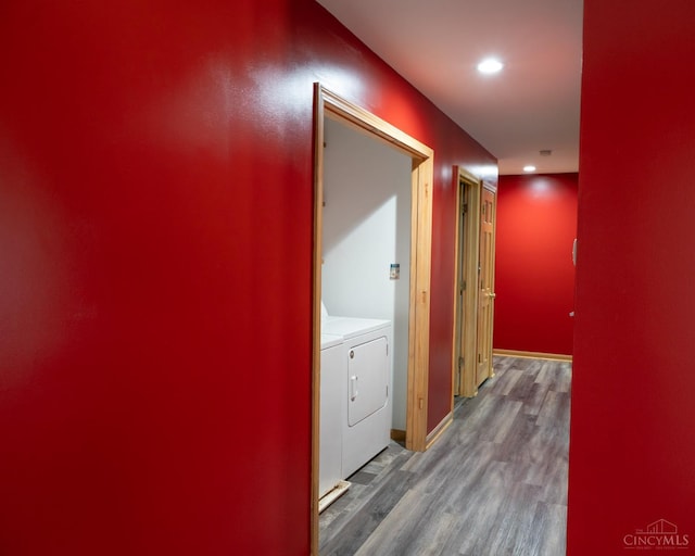 945 Lazenby Rd, Washington Twp, OH 45148 - hall featuring washer and clothes dryer, wood finished floors, and recessed lighting