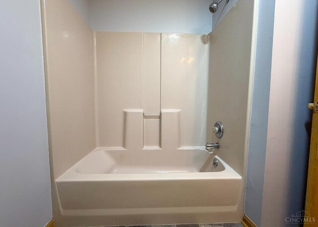 945 Lazenby Rd, Washington Twp, OH 45148 - bathroom featuring washtub / shower combination